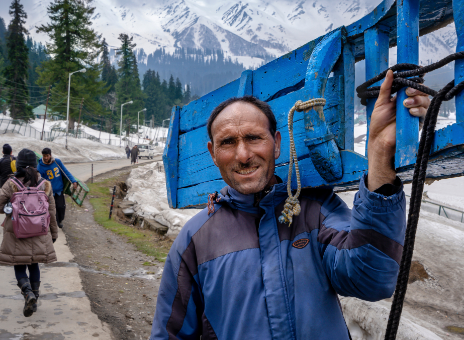 tourist skiing, ski bikes, sledging, snow mobile in Gulmarg